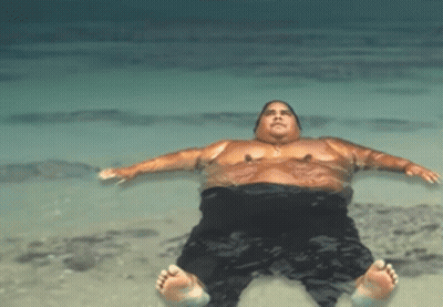 Man Laying On His Back In Water GIF