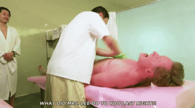 Man Laying On Pink Table Asking What Did Mrs Lee Do To You Last Night GIF