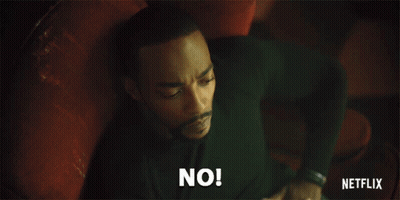 Man Laying On Red Couch Saying No GIF