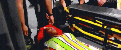 Man Laying On Stretcher With Blanket On Head GIF
