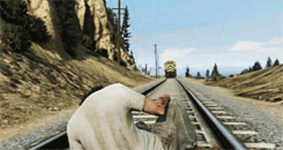 Man Laying On Train Track With Train Going By GIF