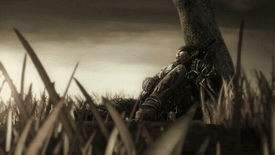 Man Laying Under Tree With Rifle GIF