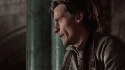 Man Leaning Against Green Pillar Mouth Open GIF