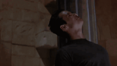 Man Leaning Against Wall Roman's Brother GIF