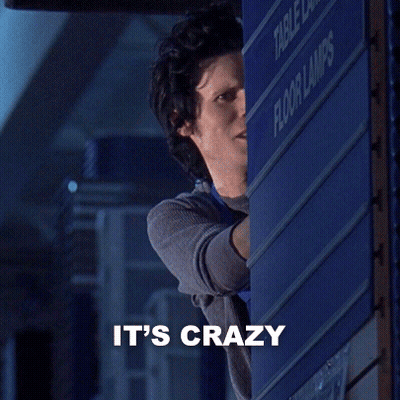 Man Leaning Against Wall Saying It's Crazy GIF