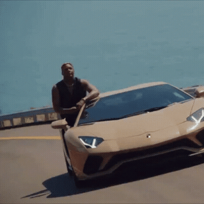 Man Leaning On Lamborghini Aventador GIF