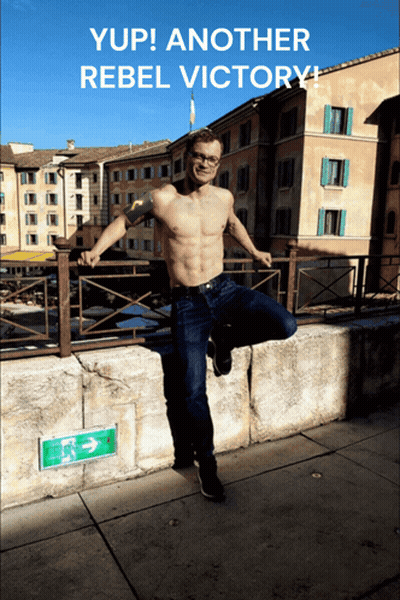 Man Leaning On Railing With Rebel Victory GIF