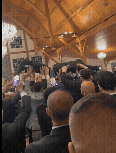 Man Lifted In Air By Group Of People GIF
