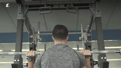 Man Lifting Barbell In Gym With Letter E GIF
