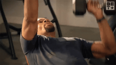 Man Lifting Dumbbell On Bench GIF