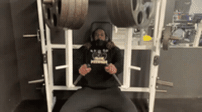 Man Lifting Dumbbells Overhead Level 2 DB OHP GIF