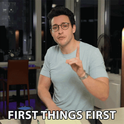 Man Light Blue Shirt Glasses Saying First Things First GIF
