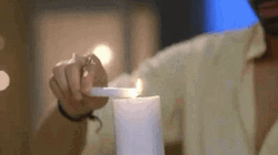 Man Lighting Bougie In A Date GIF