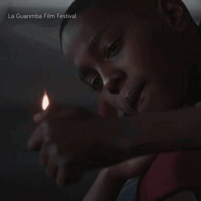 Man Lighting Candle La Guarimba Film Festival GIF