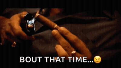 Man Lighting Cigar With Bout That Time GIF