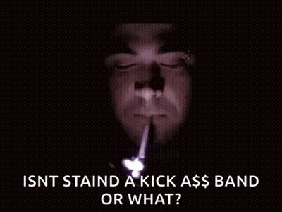 Man Lighting Cigarette Isn't Staind A Kick Ass Band Or What GIF
