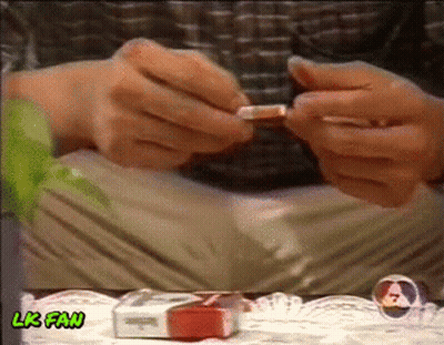 Man Lighting Cigarette GIF