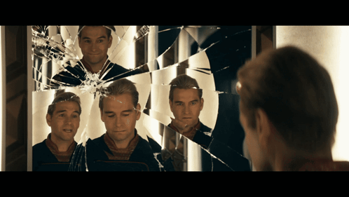Man Looking At Broken Mirror GIF