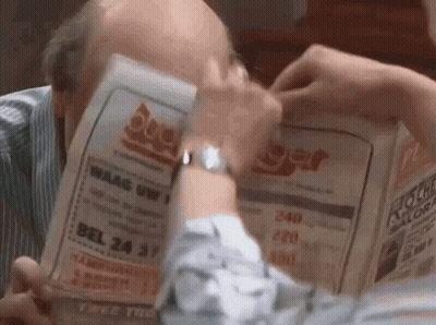 Man Looking At Burger Flyer GIF