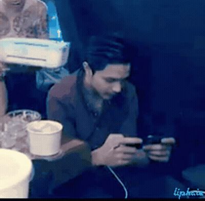 Man Looking At Cell Phone Lipnote GIF