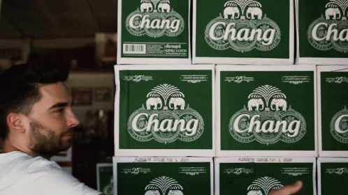 Man Looking At Chang Beer Boxes GIF