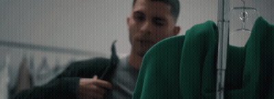 Man Looking At Green Jacket GIF