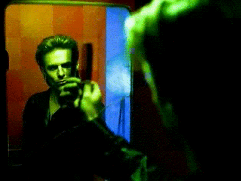 Man Looking At Himself In Mirror GIF