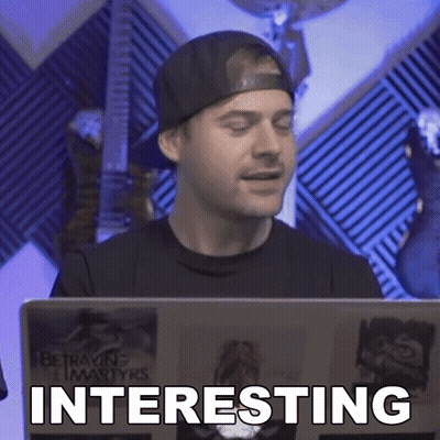 Man Looking at Laptop Saying Interesting