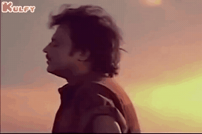 Man Looking At Sun At Sunset GIF