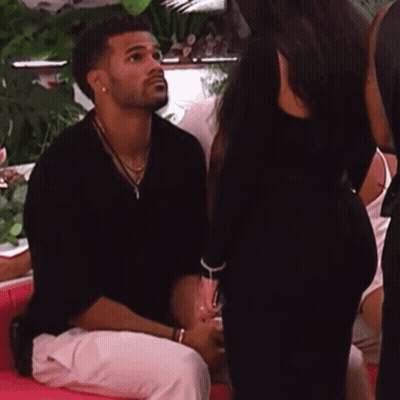 Man Looking At Woman's Butt GIF