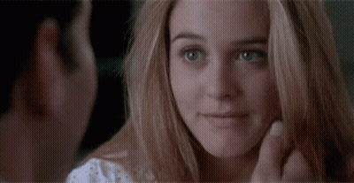 Man Looking At Woman's Face Close Up GIF