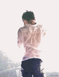 Man Looking Back With His Wet Tshirt GIF
