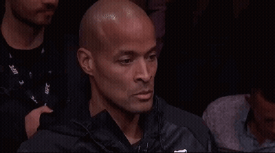 Man Looking Down With UFC Lanyard GIF