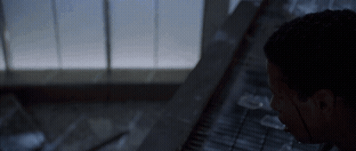 Man Looking In Dark Room With Window GIF