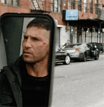 Man Looking In Rear View Mirror GIF