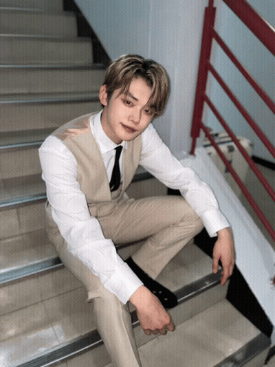 Man Looking Out Of Hole In Wall GIF