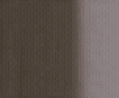 Man Looking Out Of Hole In Wall GIF