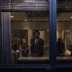 Man Looking Out The Rain On Window GIF