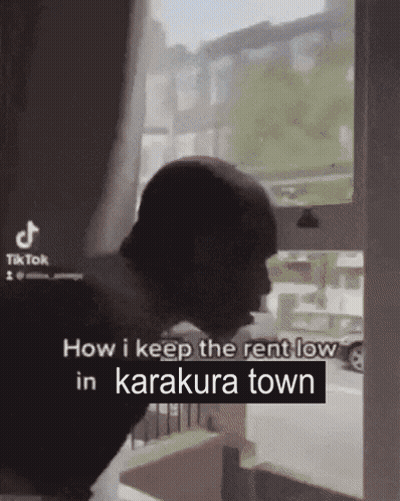 Man Looking Out Window In Karakura Town GIF