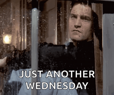 Man Looking Out Window Saying Just Another Wednesday GIF