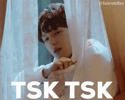 Man Looking Out Window Saying Tsk Tsk GIF