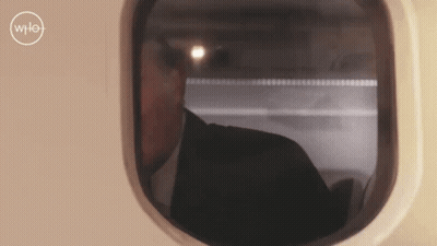 Man Looking Out Window With WPL Logo GIF