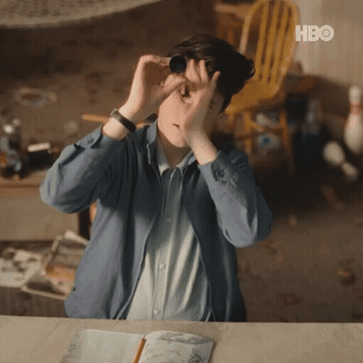 Man Looking Through Binoculars With HBO Logo GIF
