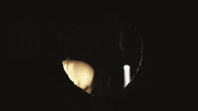 Man Looking Through Hole GIF