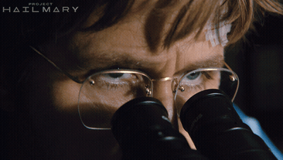 Man Looking Through Microscope Project Hailmary