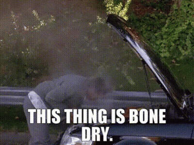 Man Looking Under Car Hood Saying This Thing Is Bone Dry GIF