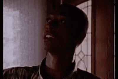 Man Looking Up In Dark Room GIF