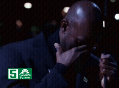 Man Looking Up In Front Of CNBC Sports Boston Sign GIF