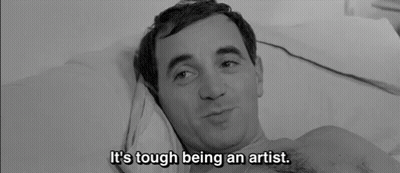 Man Lying In Bed With It's Tough Being An Artist GIF