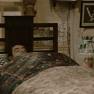 Man Lying In Bed With Lamp And Dog Picture GIF
